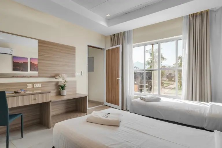 Bright twin bedroom at the hotel in Fujairah