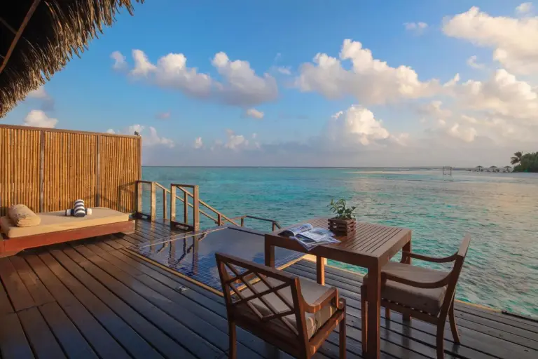 Outdoor lounge area of a villa at Adaaran Prestige Vadoo