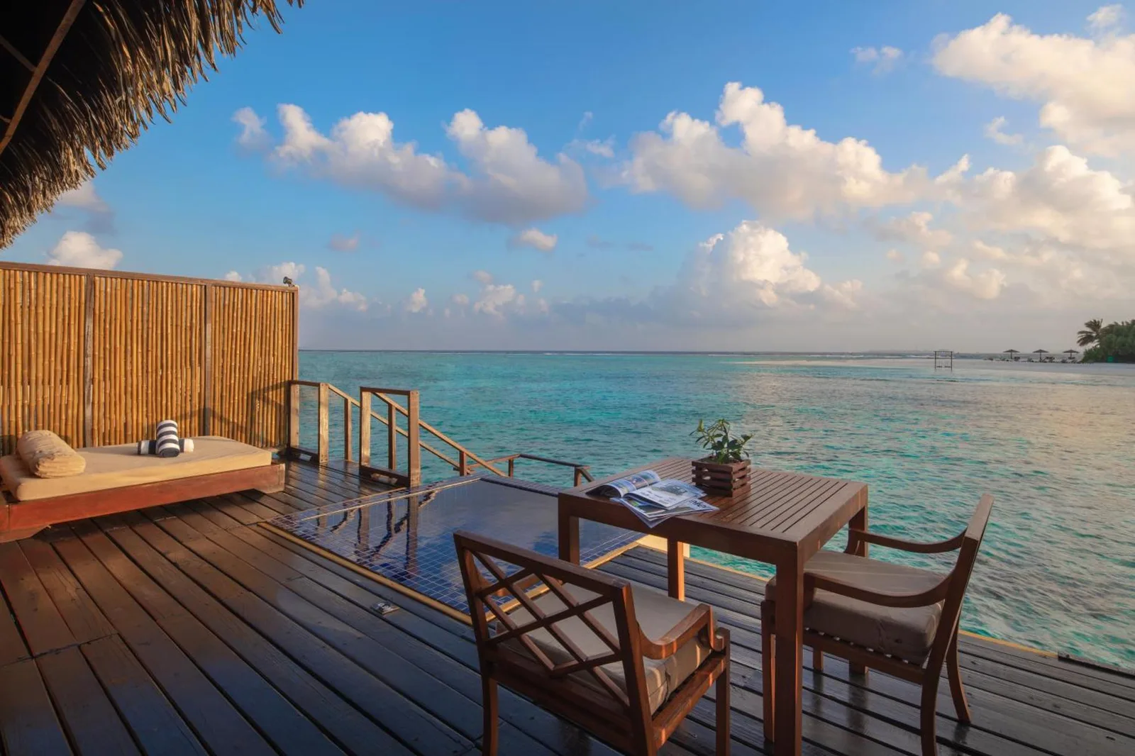 Outdoor lounge area of a villa at Adaaran Prestige Vadoo