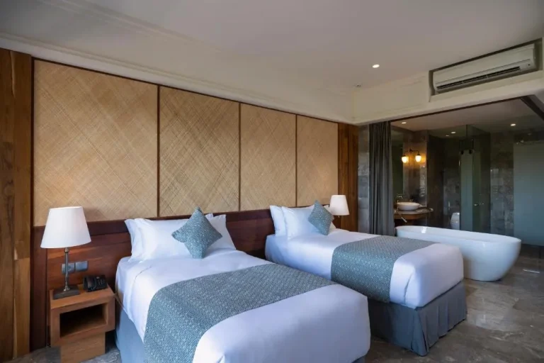 Twin bedroom at Adiwana Bisma in Ubud