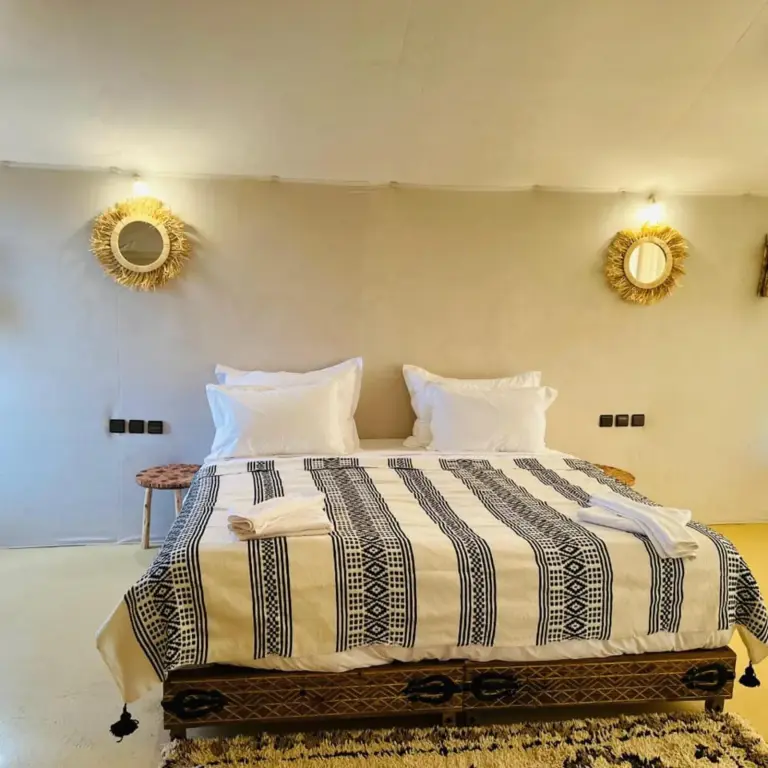 Inviting bedroom space at Africa Stars Camp in Merzouga.