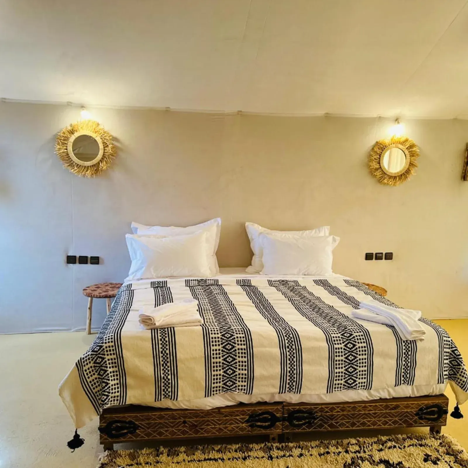 Inviting bedroom space at Africa Stars Camp in Merzouga.