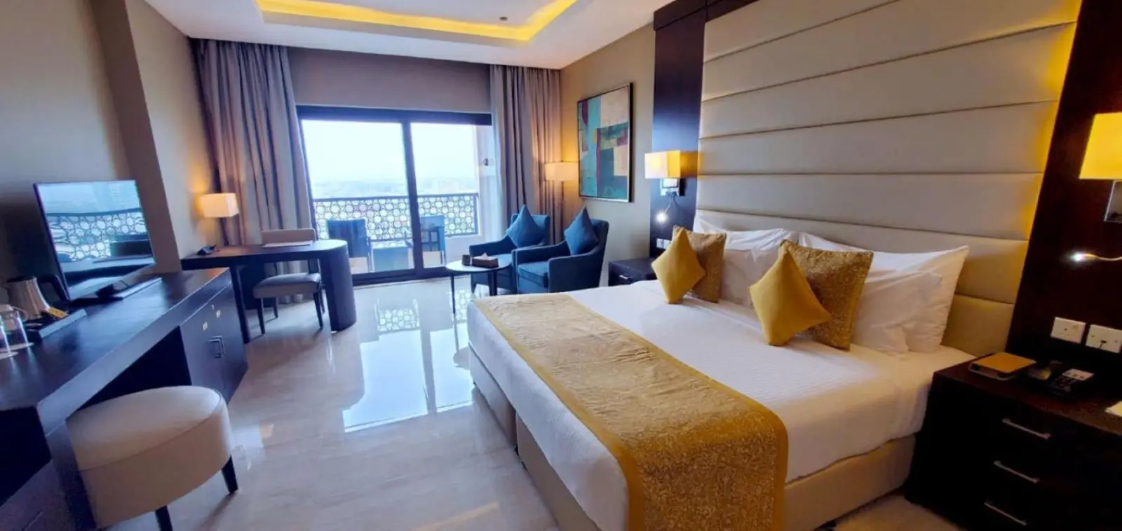 Deluxe room in Al Bahar Hotel & Resort with modern decor