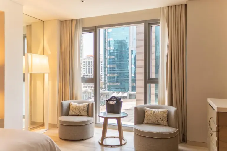 Corner seating area with city view at Al Bandar Rotana – Dubai Creek in Dubai