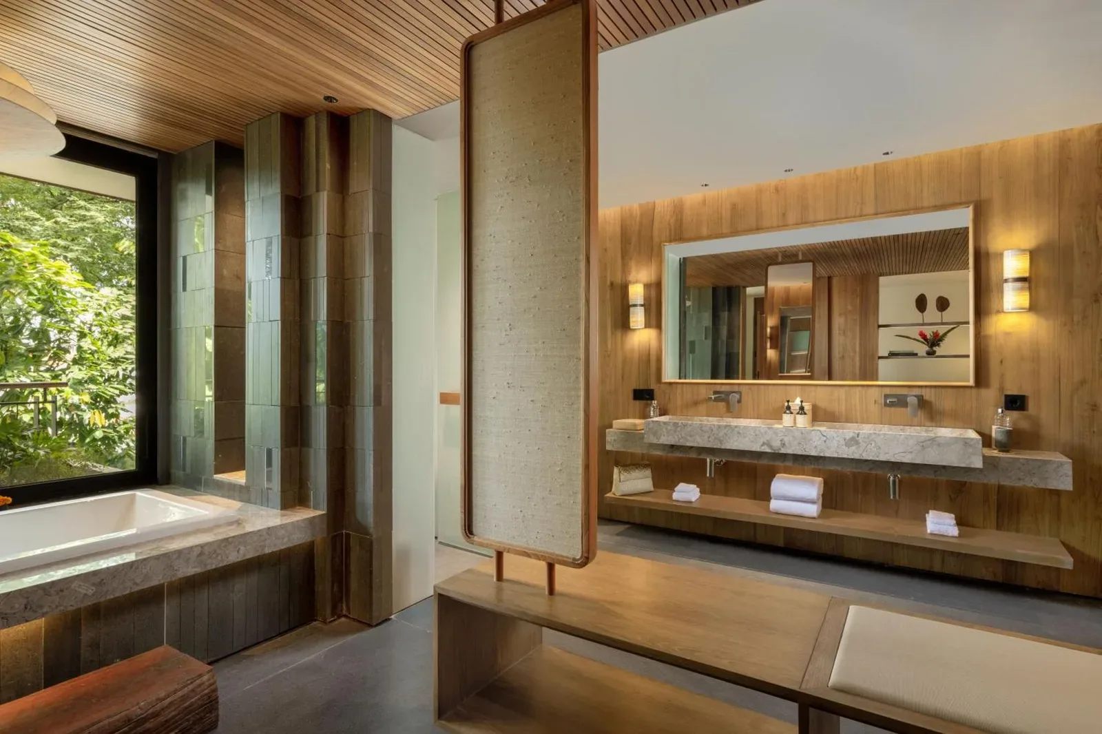 Alaya Suites Ubud luxury bathroom with modern amenities