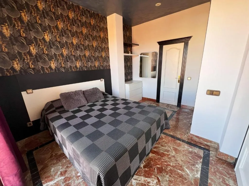 Stylish Bedroom at Alhambra Suites in Madrid