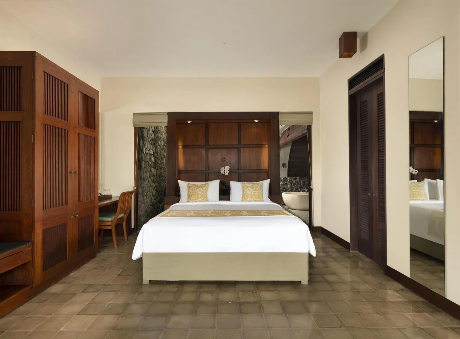 Cozy bedroom setup at Alila Ubud with stylish furnishings