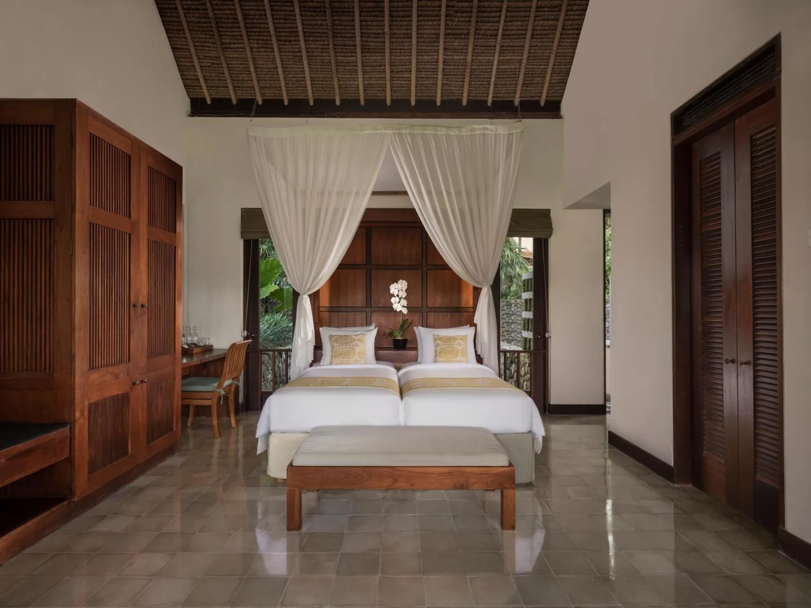 Twin room setup at Alila Ubud with elegant decor