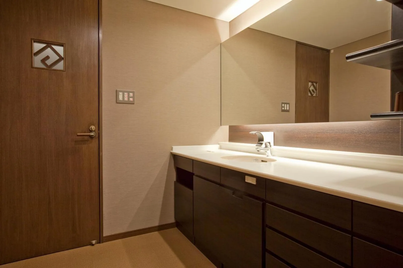 Lavabo del baño en AMANE resort GAHAMA en Beppu
