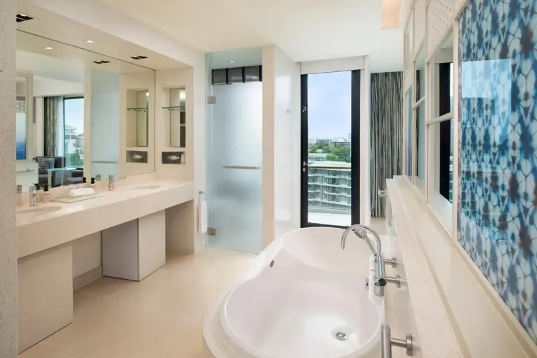 Elegant bedroom suite at Amari Pattaya with sea views