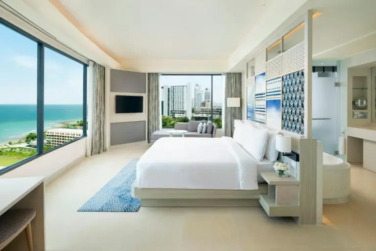 Modern guest room at Amari Pattaya with city skyline view