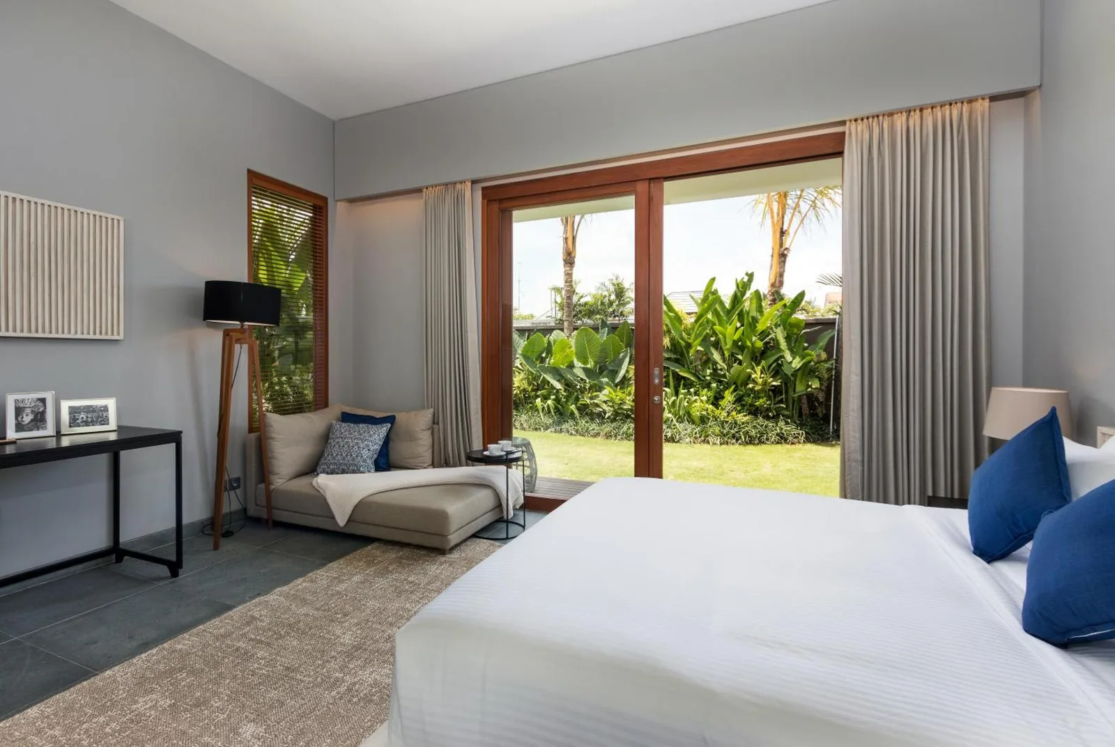 Cozy relaxation area in a suite at Amarin Seminyak, Seminyak