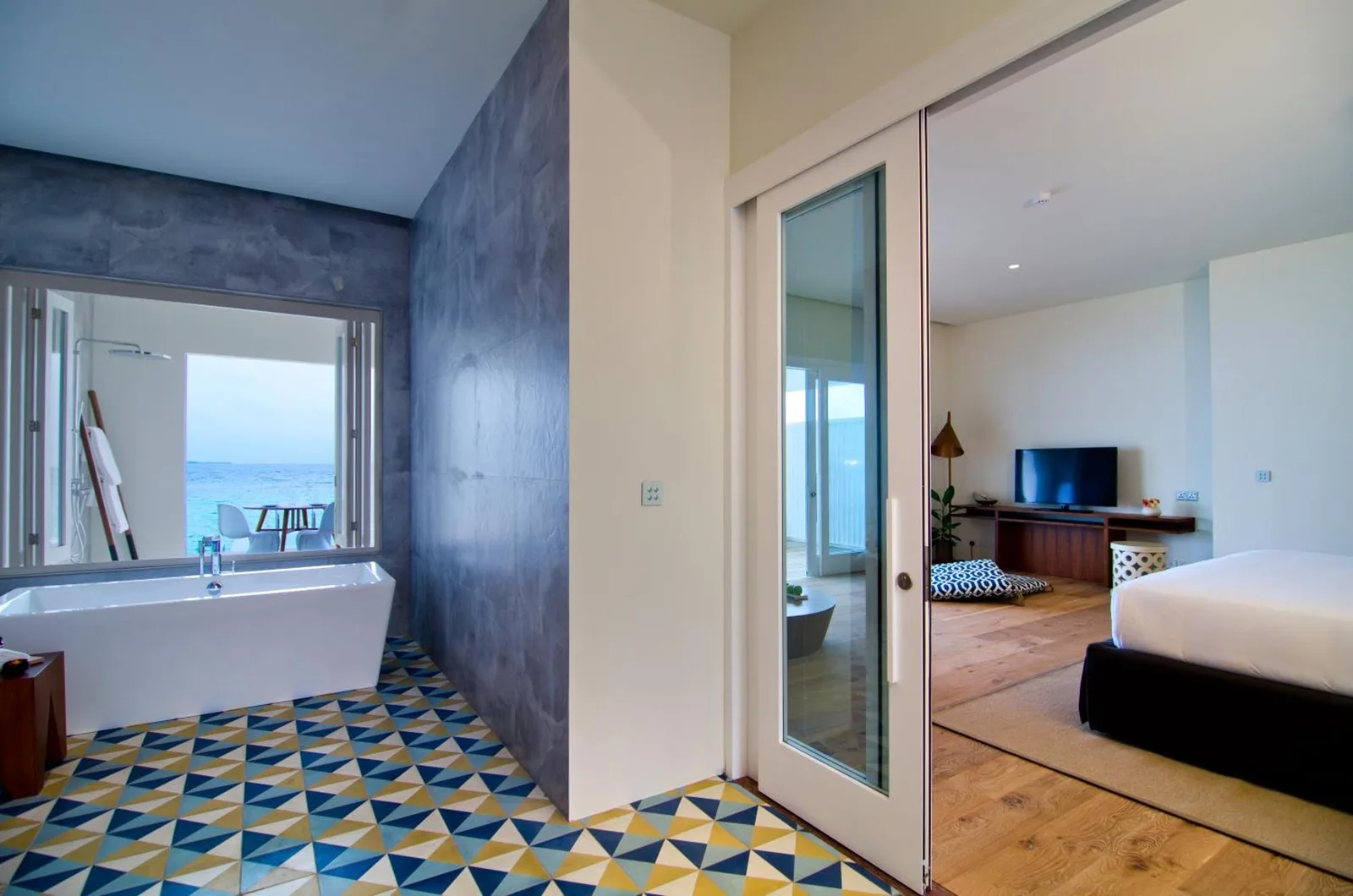 Stylish bathroom at Amilla Maldives with a view