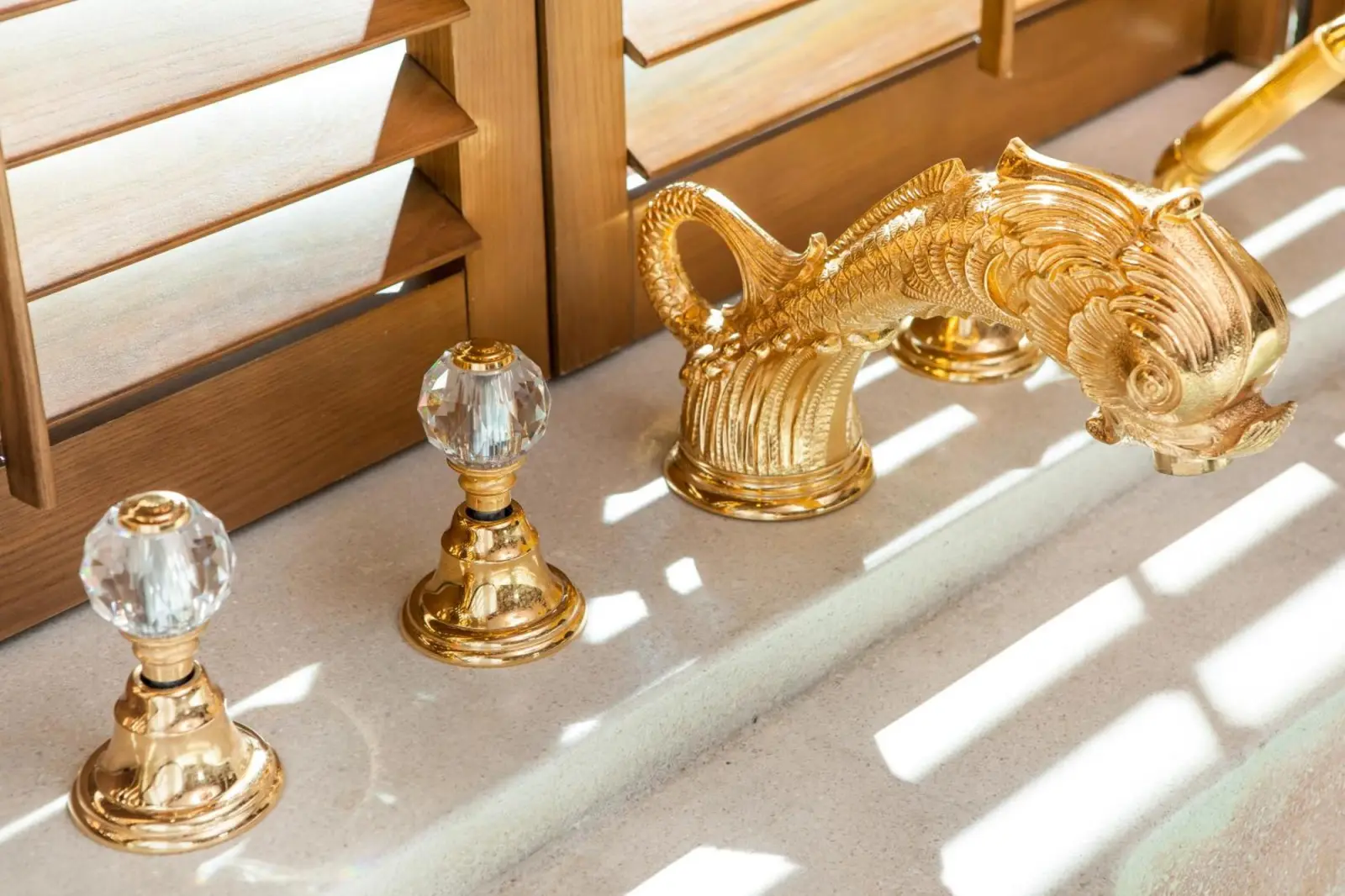 Elegant golden faucet in Ammatara Pura Pool Villa in Koh Samui