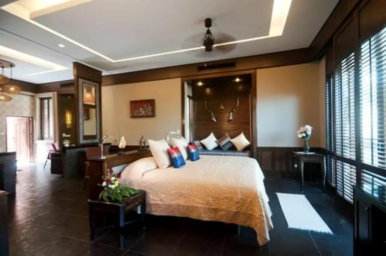 Elegant bedroom at Ammatara Pura Pool Villa in Koh Samui