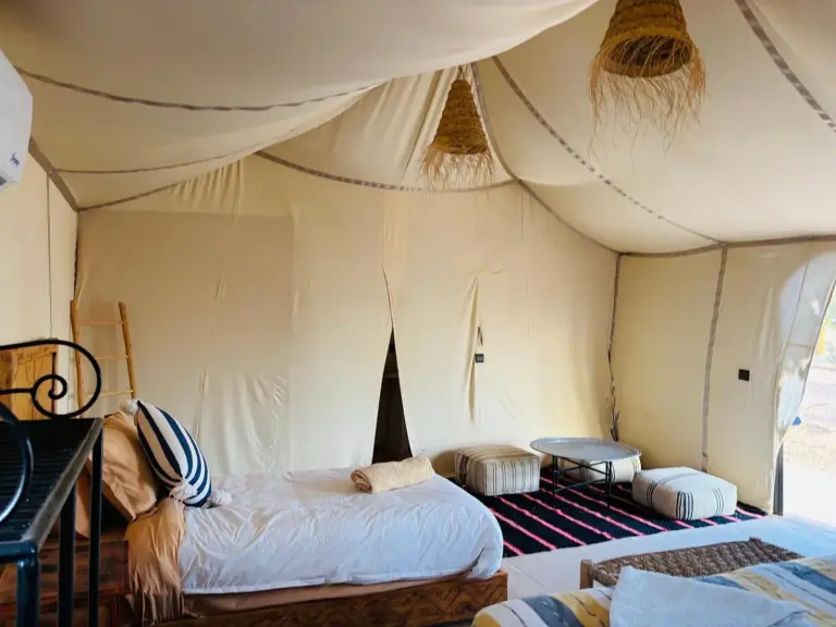 Interior view of a cozy tent at Amskou Camp