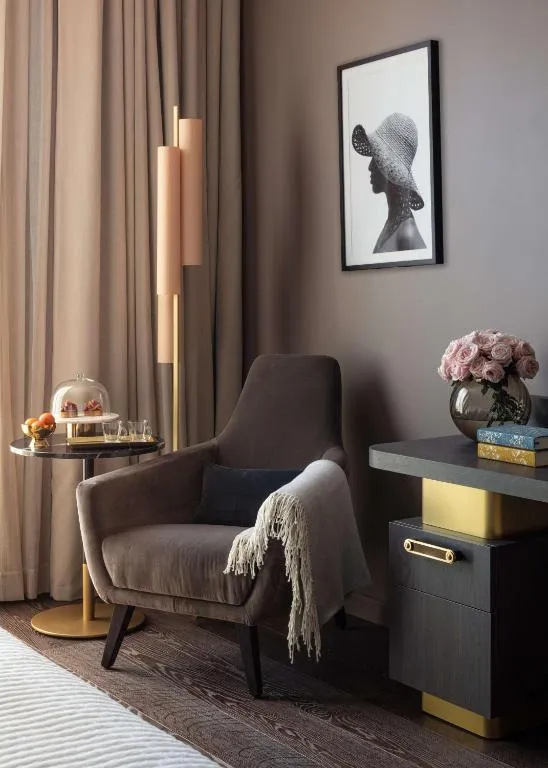 Anantara Plaza Nice Hotel lounge chair with decor