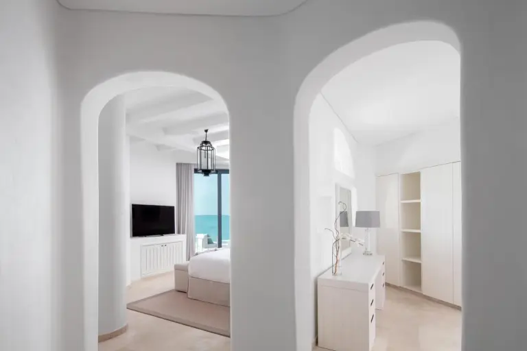 Entrance to a guest room at Anantara Retreat Santorini Abu Dhabi - Adults Only