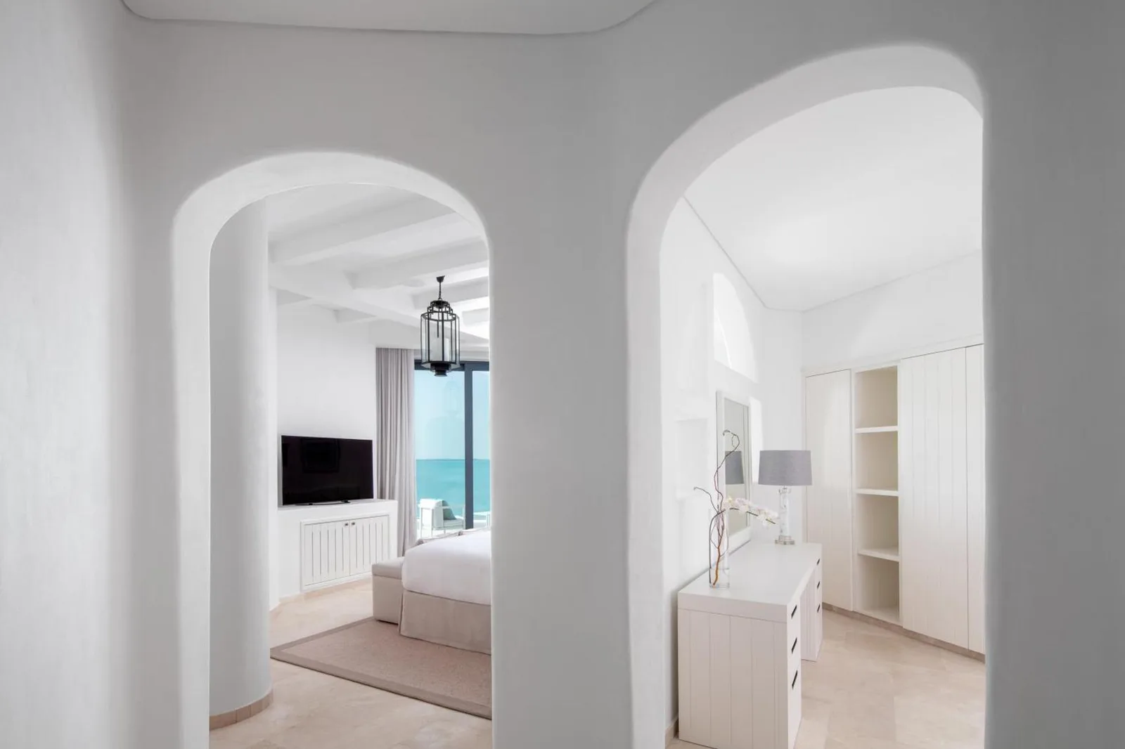 Entrance to a guest room at Anantara Retreat Santorini Abu Dhabi - Adults Only
