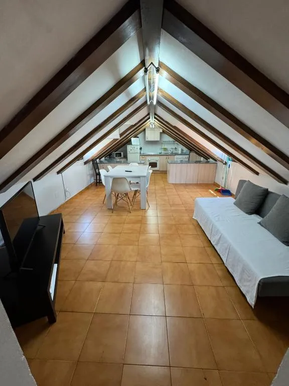 Attic style room at Aparsol Apartments in Madrid