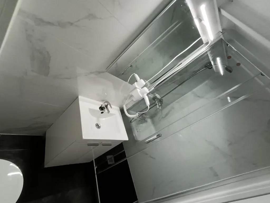 Modern bathroom at Aparsol Apartments in Madrid