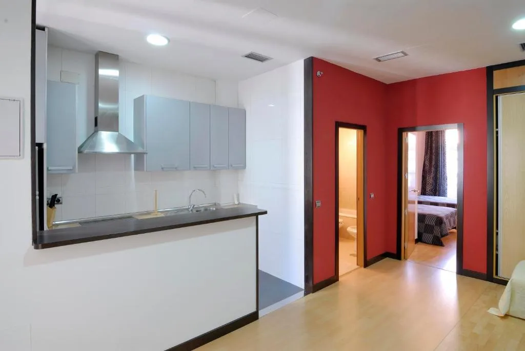 Kitchenette at Apartamentos El Tiempo in Madrid