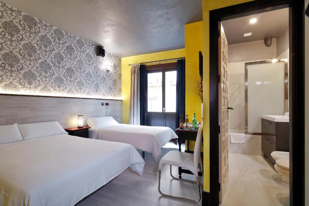 Double Room and Bathroom at Apartamentos El Tiempo Madrid