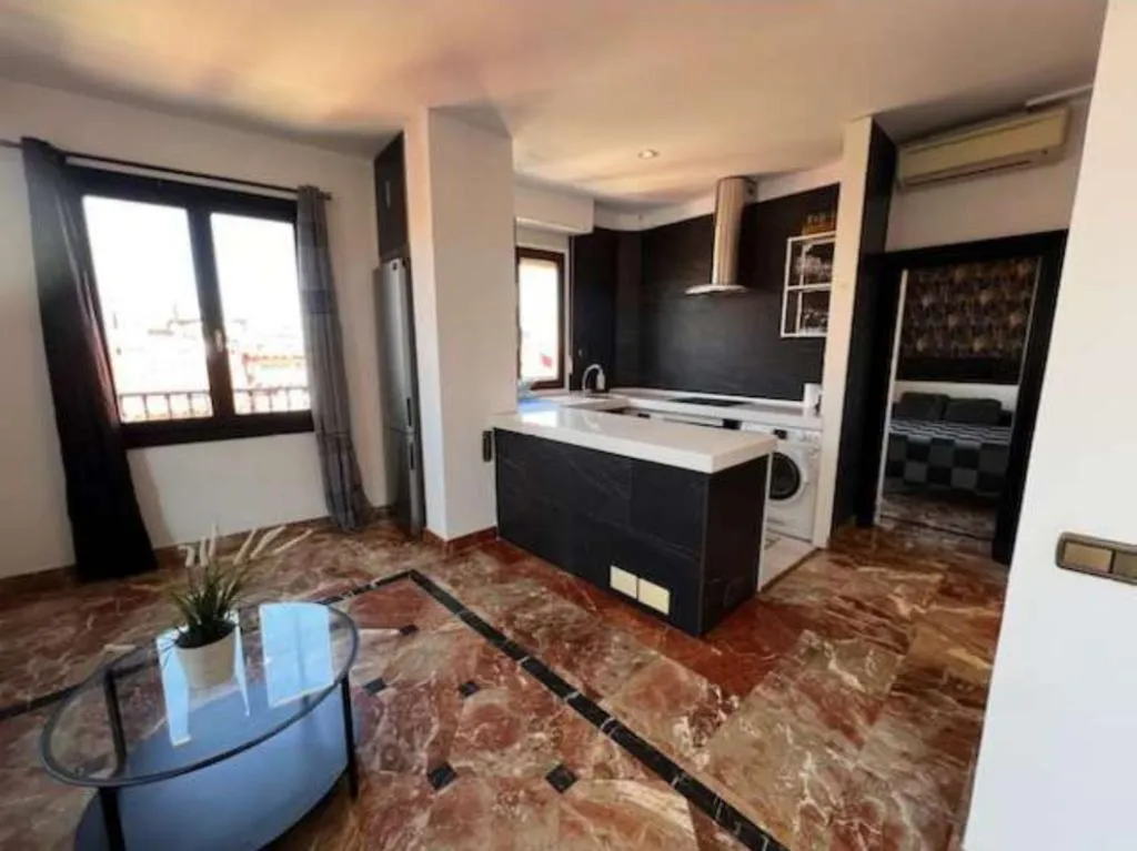 Spacious kitchen in Apartamentos El Tiempo Madrid