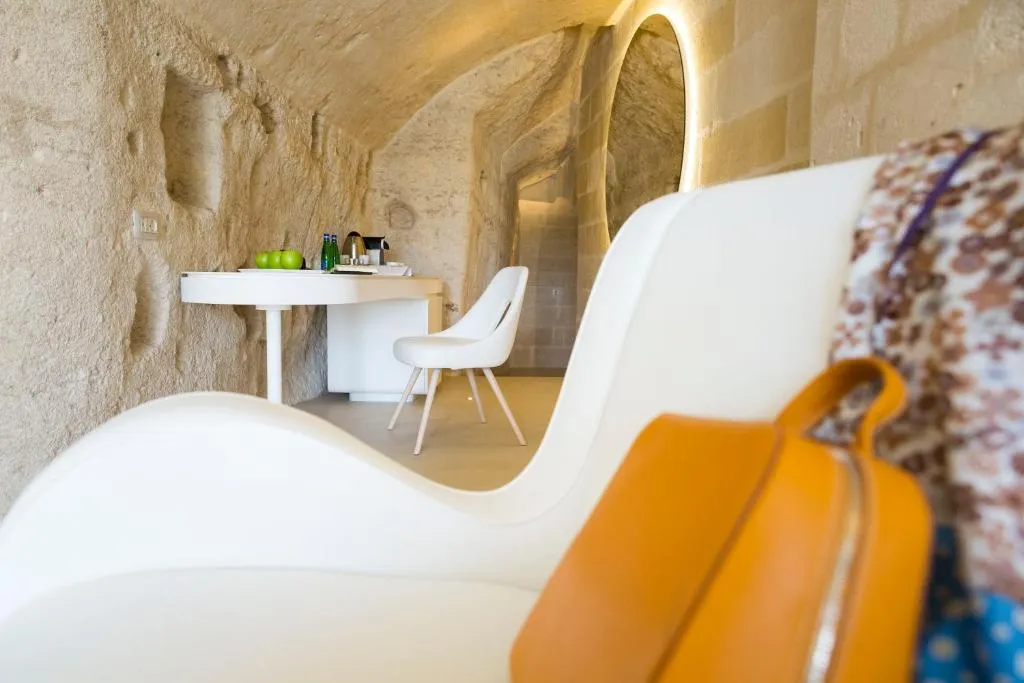 Living space with seating at Aquatio Cave Luxury Hotel & SPA in Matera