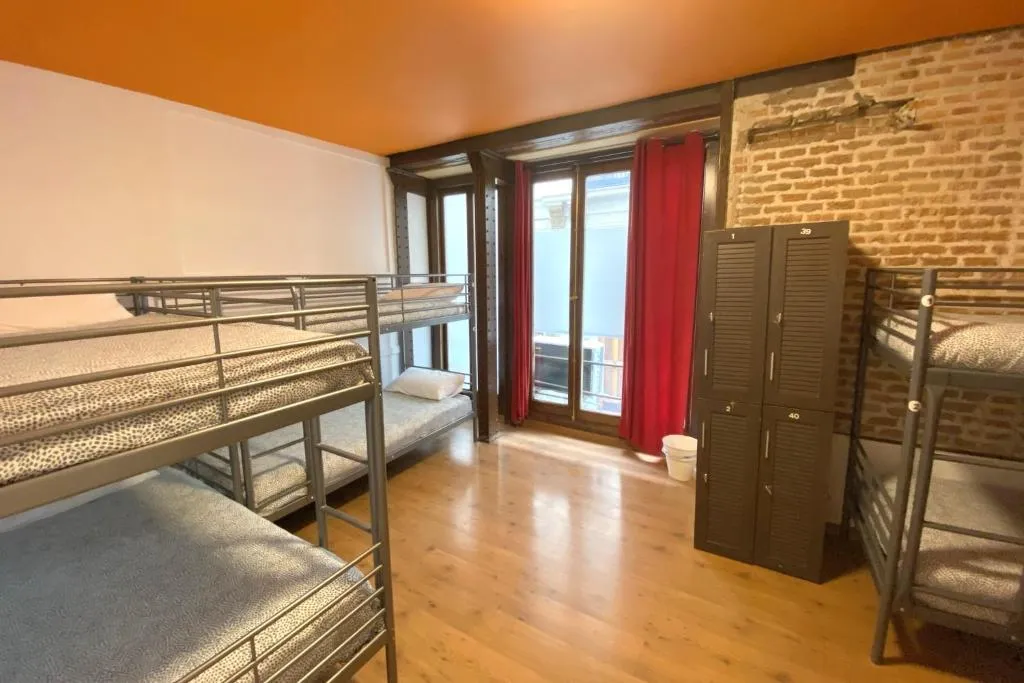 Arc House Madrid shared dorm room with bunk beds