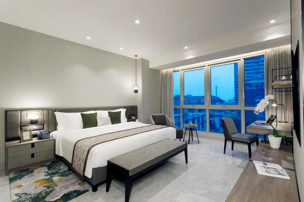 Habitación de huéspedes en Ascott Menteng Jakarta con cama doble