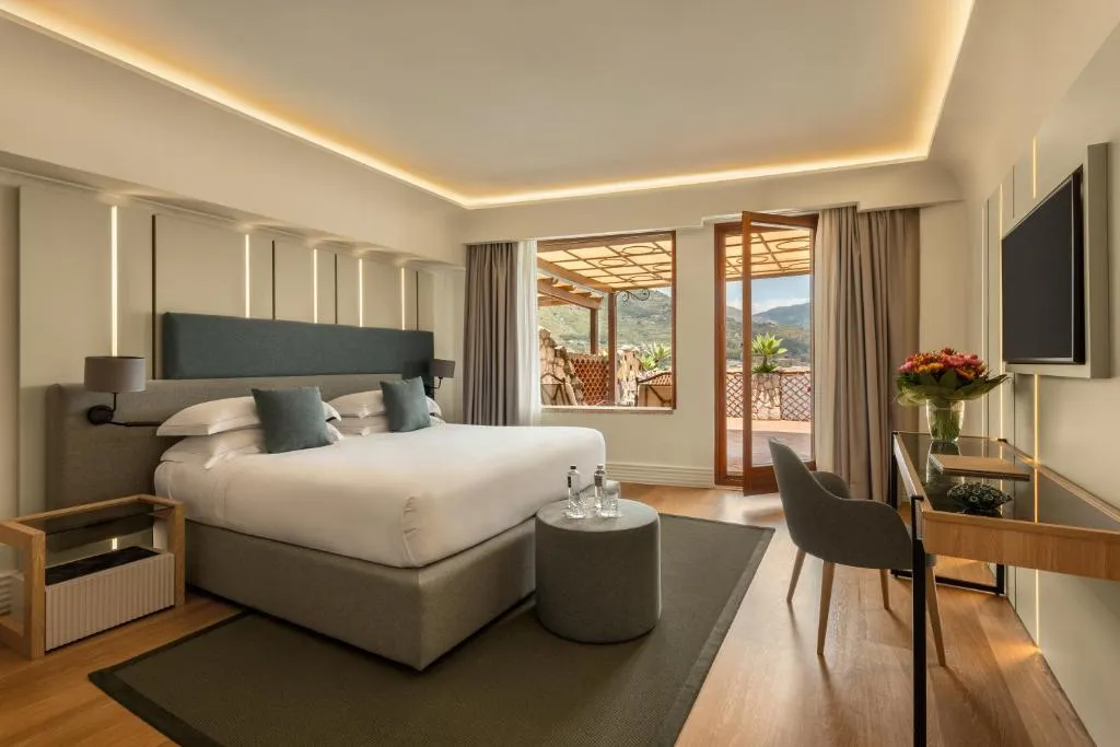 Atlantis Bay hotel modern bedroom with balcony access