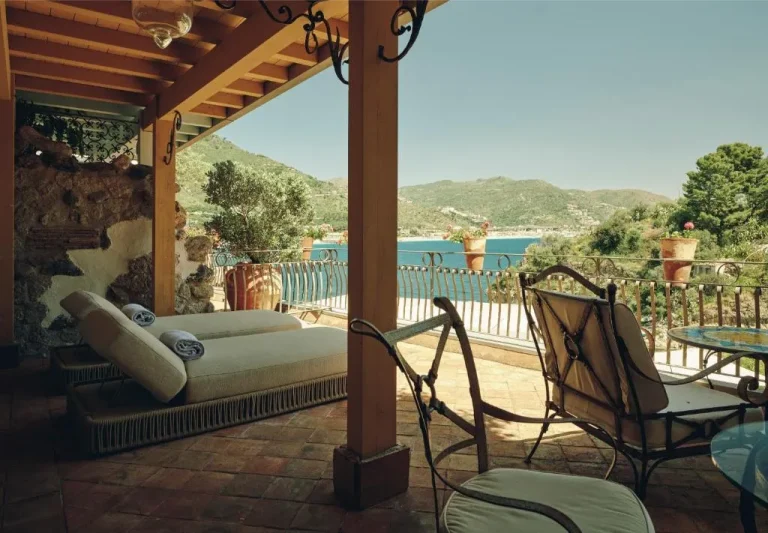 Atlantis Bay hotel terrace with seating and sea view
