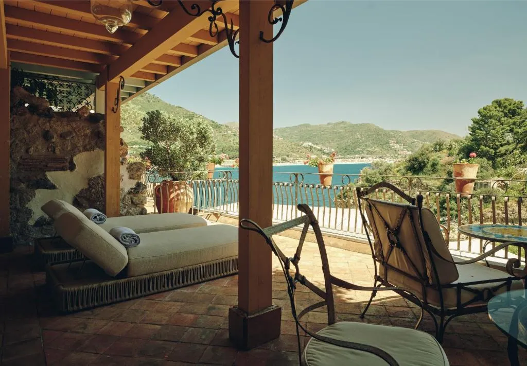 Atlantis Bay hotel terrace with seating and sea view