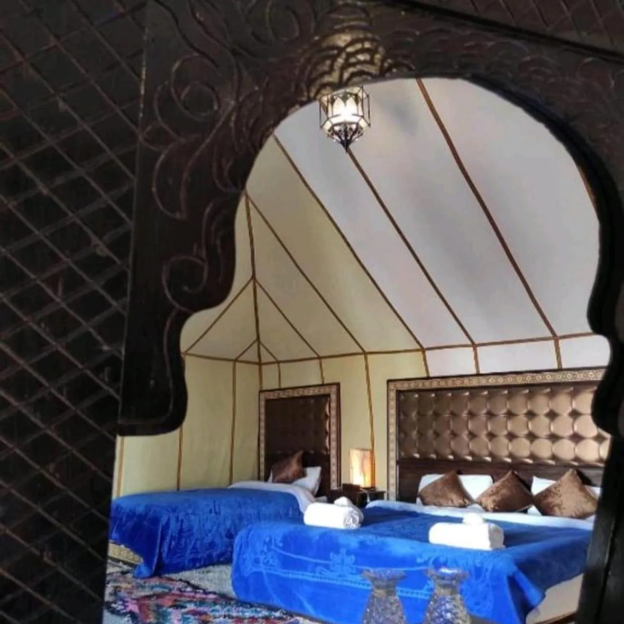 Elegant tent interior at Authentic Luxury Camp, Merzouga