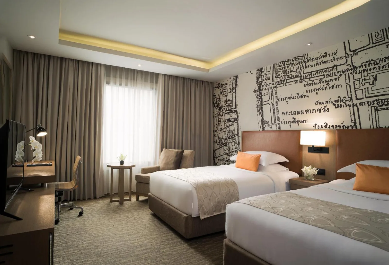 Chambre familiale de l'Avani Ratchada Bangkok Hotel avec deux lits