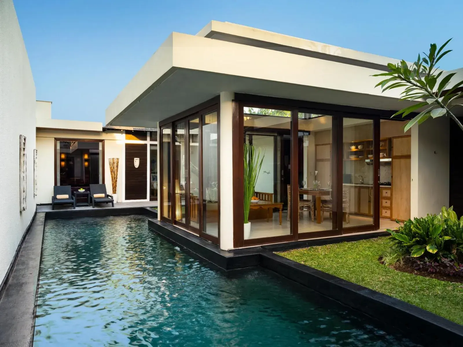 Avani Seminyak Bali Resort villa exterior with pool