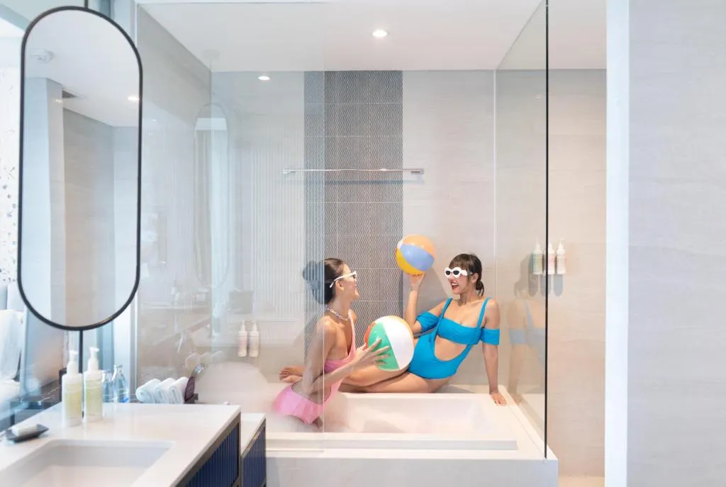 Avani Sukhumvit Bangkok Hotel guests playing in bathtub