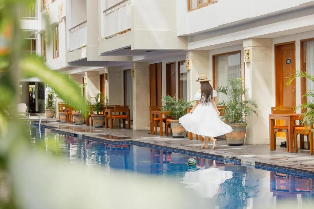 Guest enjoying the pool area at Bali Sun Tropical Hotel & Spa
