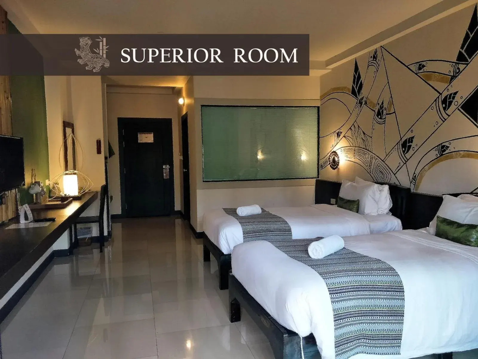 Bamboori Boutique Resort Chiang Mai superior room with twin beds and modern wall art
