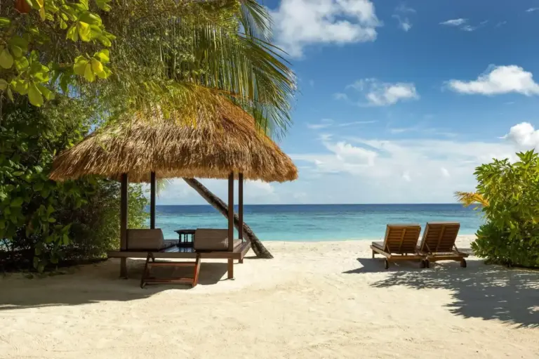 Banyan Tree Vabbinfaru beach cabana with loungers