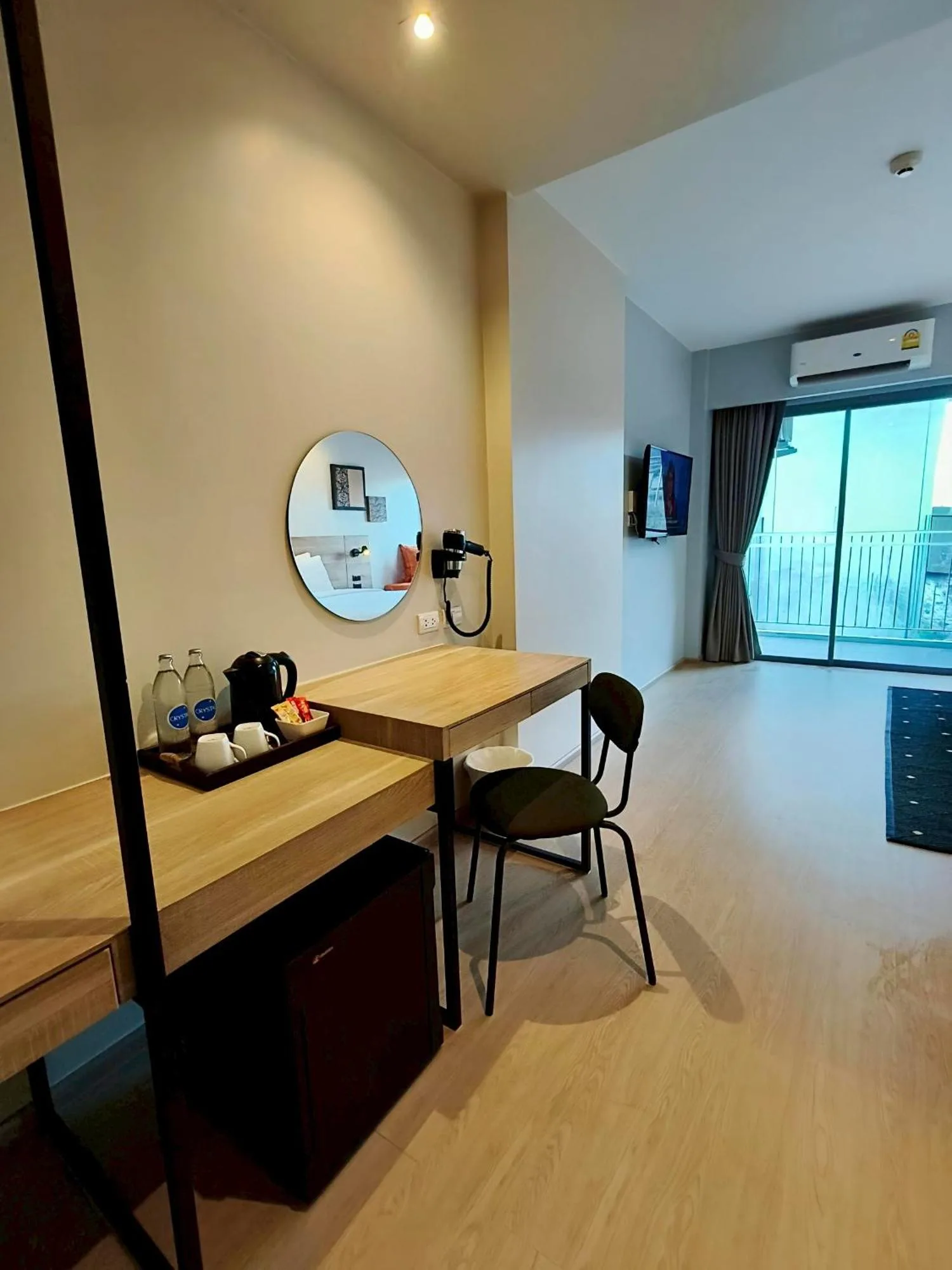 Guest room work desk and sitting area at Beehive Boutique Hotel Phuket in Phuket