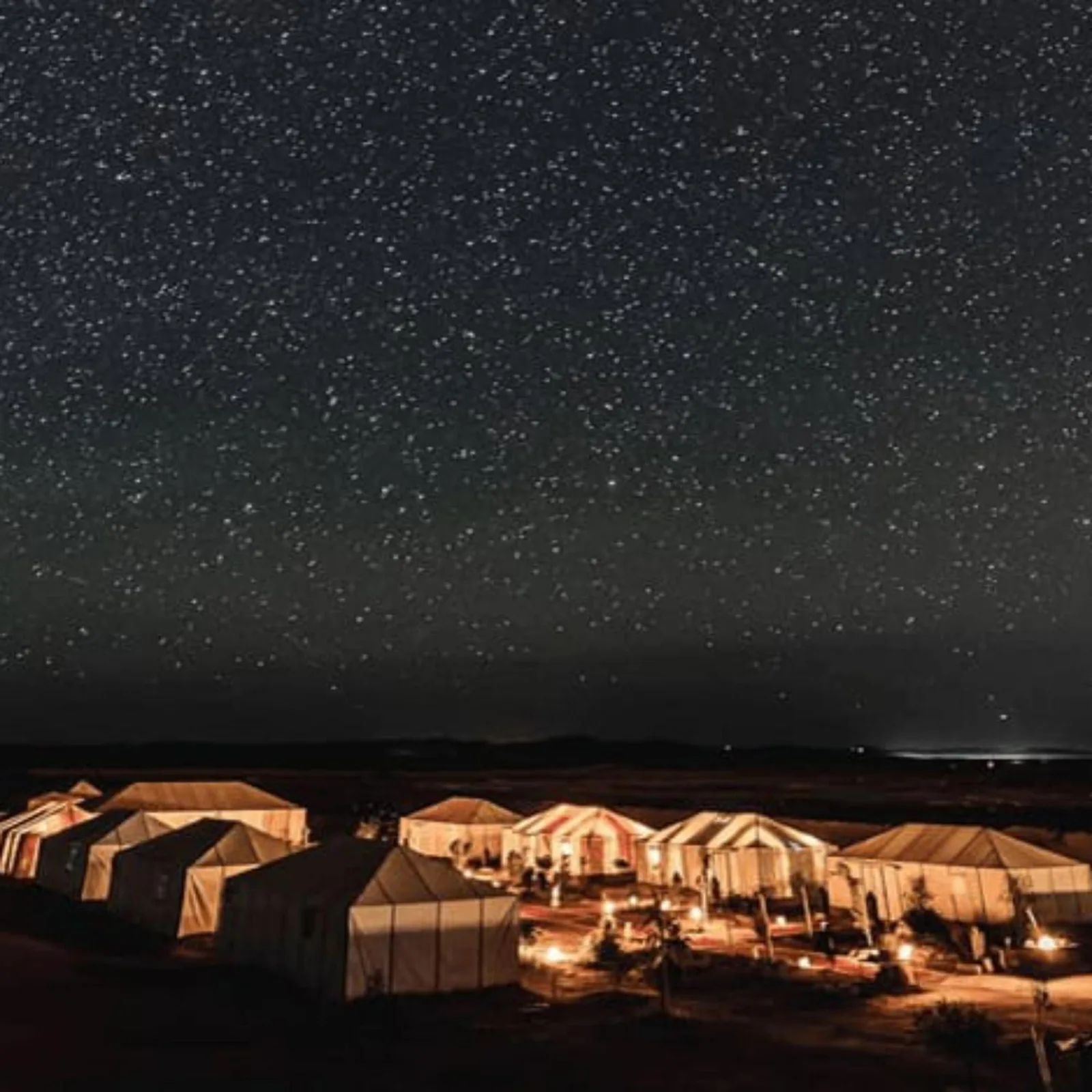 Star-filled night sky above Bikhir Luxury Camp in Merzouga