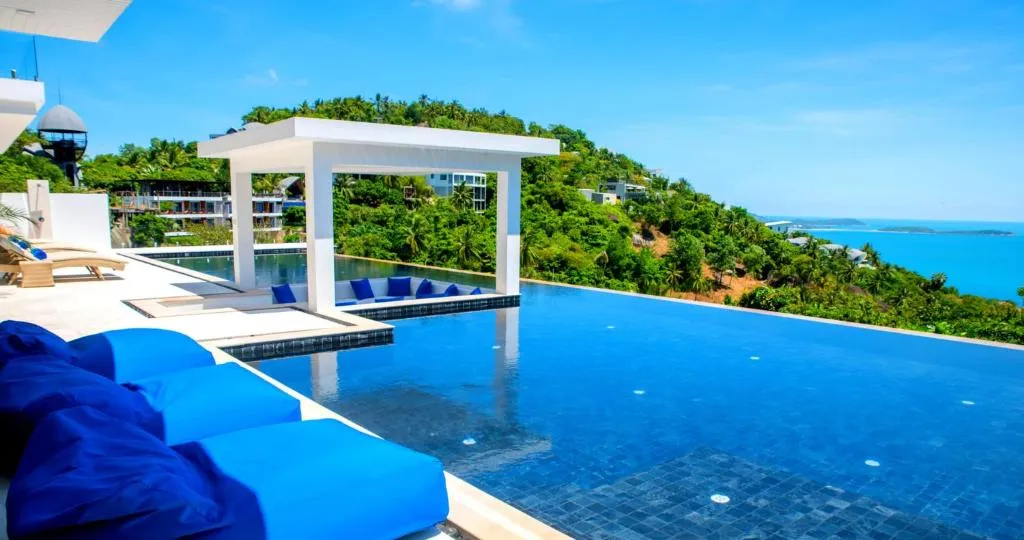 Relaxing poolside at BLUE ELEPHANT Luxury Pool Villa Koh Samui