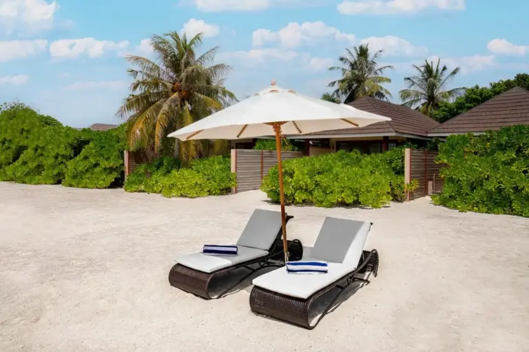 Beach loungers at Brennia Kottefaru Maldives