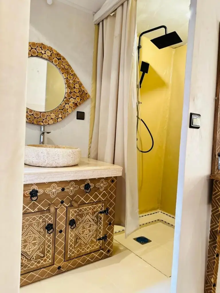 Luxury tent bathroom with vanity and shower at Brilliant luxury camp in Merzouga