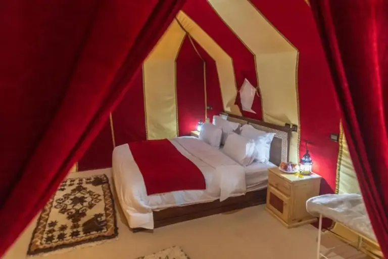 Bedroom view in a tent at Camel Trekking Camp, Merzouga