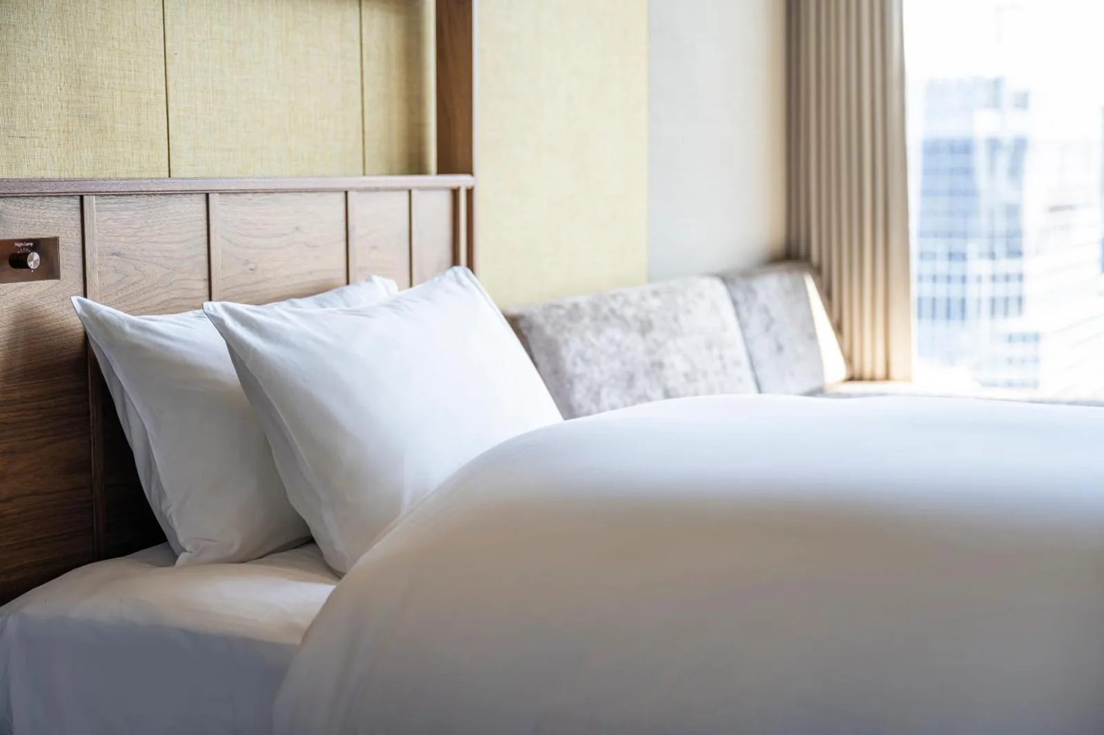Close-up of bed at Candeo Hotels Osaka The Tower