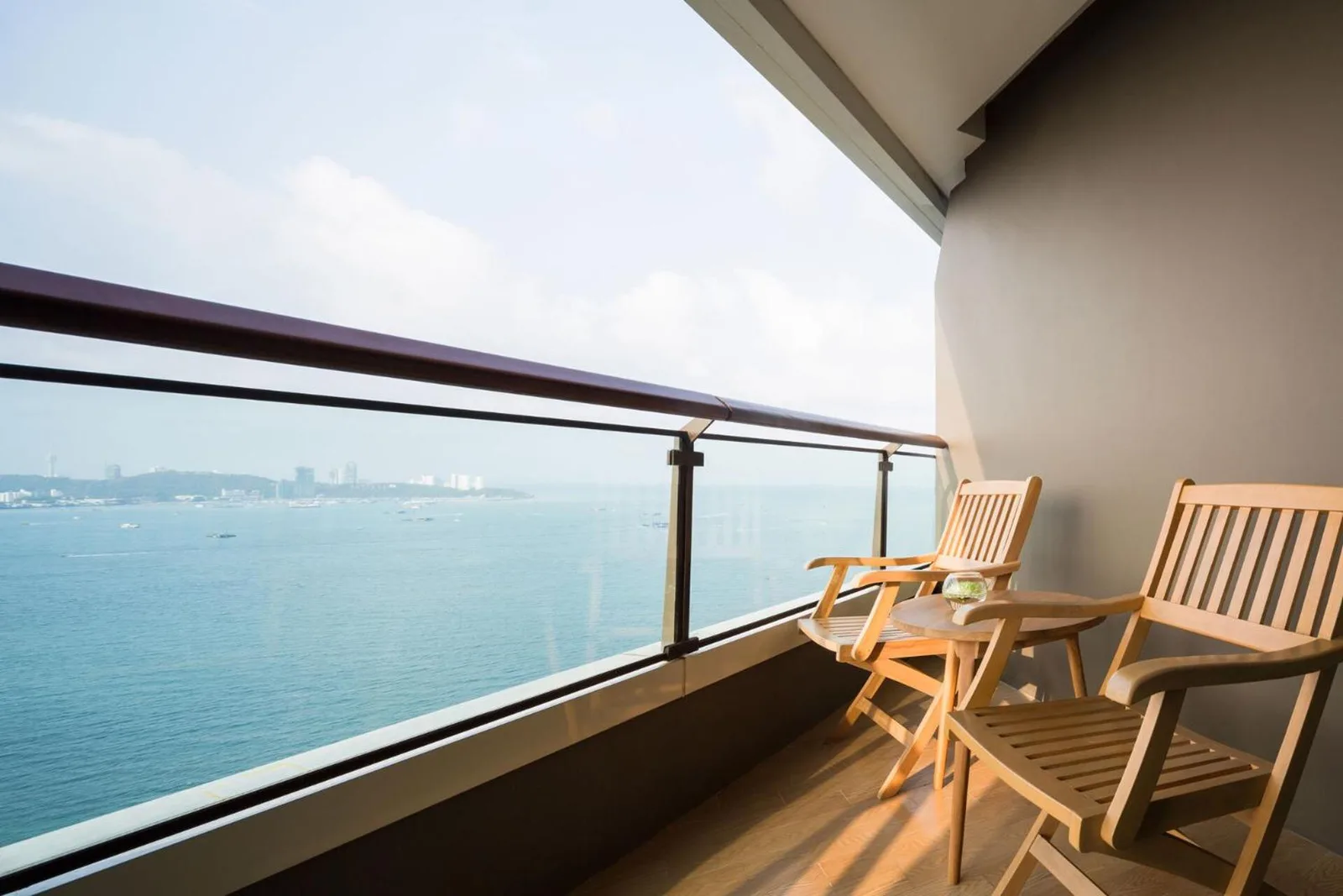 Cape Dara Resort balcony with seating and ocean view
