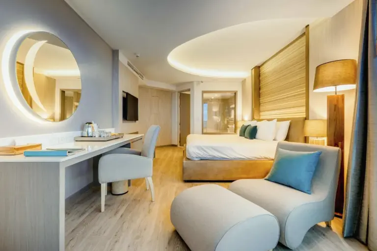 Cape Dara Resort stylish suite with seating area